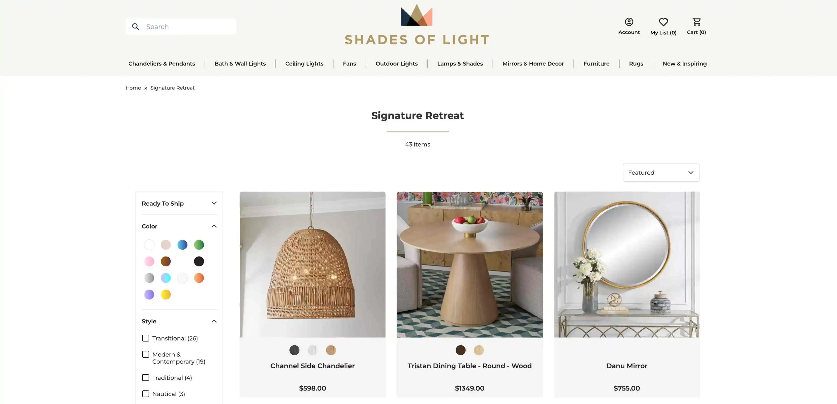 Website homepage for Shades of Light company showcasing various shapes of light fixtures