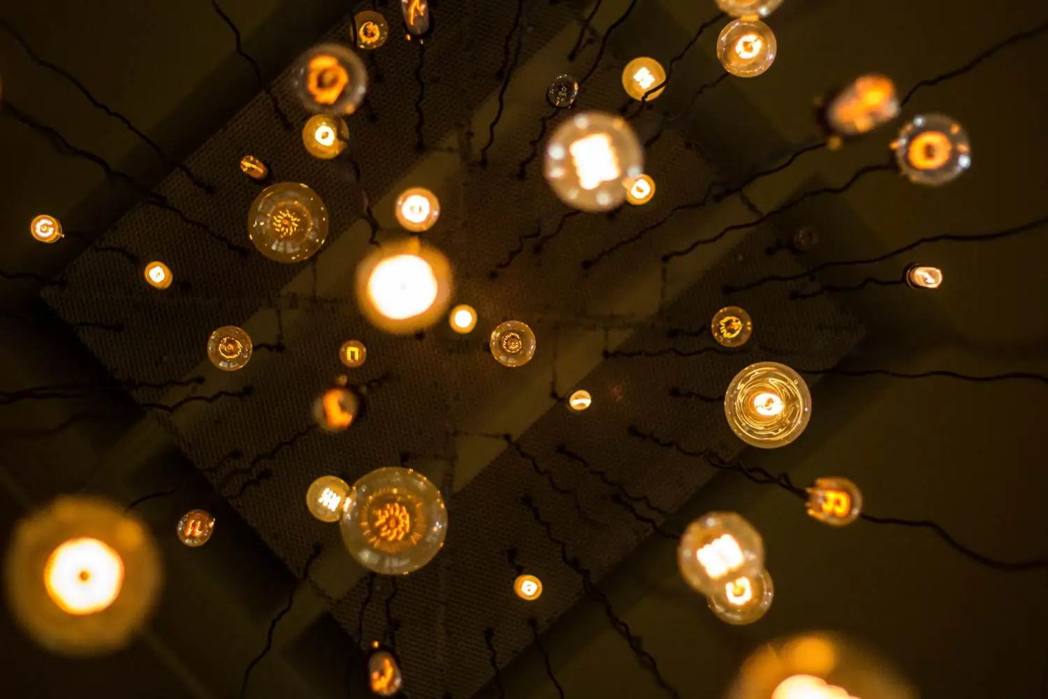 Lights hanging from ceiling in Historical Market Trends image
